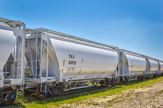 A 3,230-cubic-foot pressure differential covered hopper car