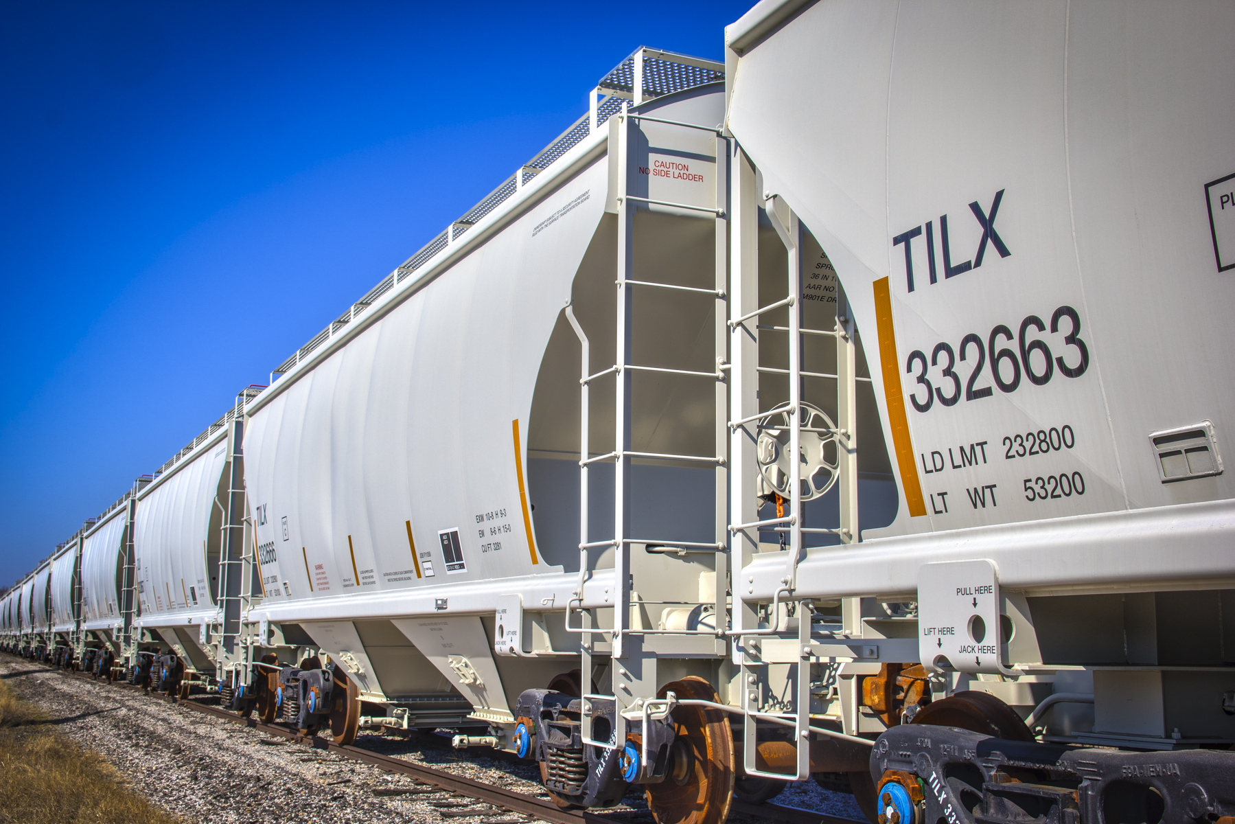 A covered hopper railcar